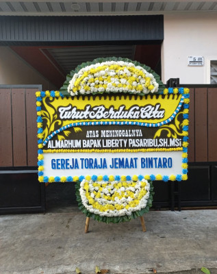 Papan Bunga Duka di Liang Anggang